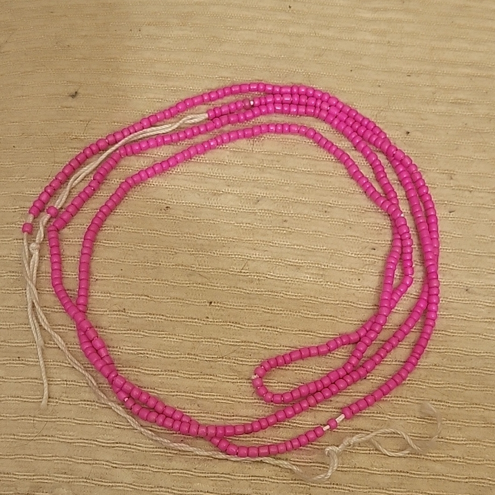 Vibrant Pink Beaded Necklace with Smooth Glossy Finish